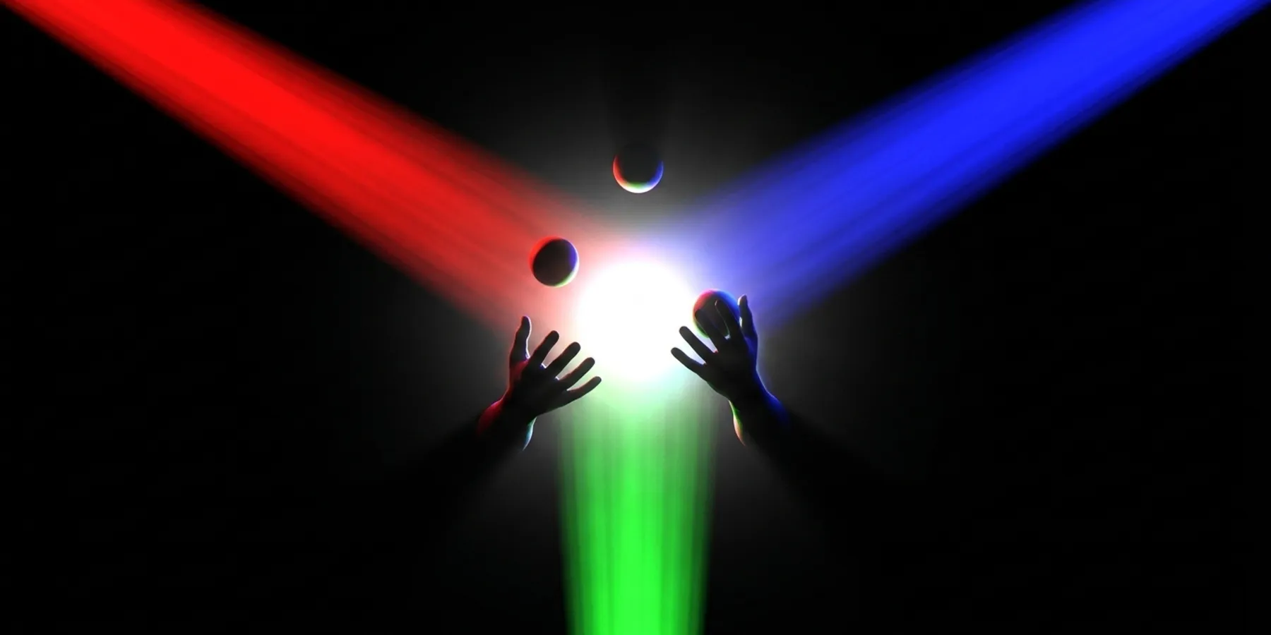 Hands juggling with colorful RGB light trails